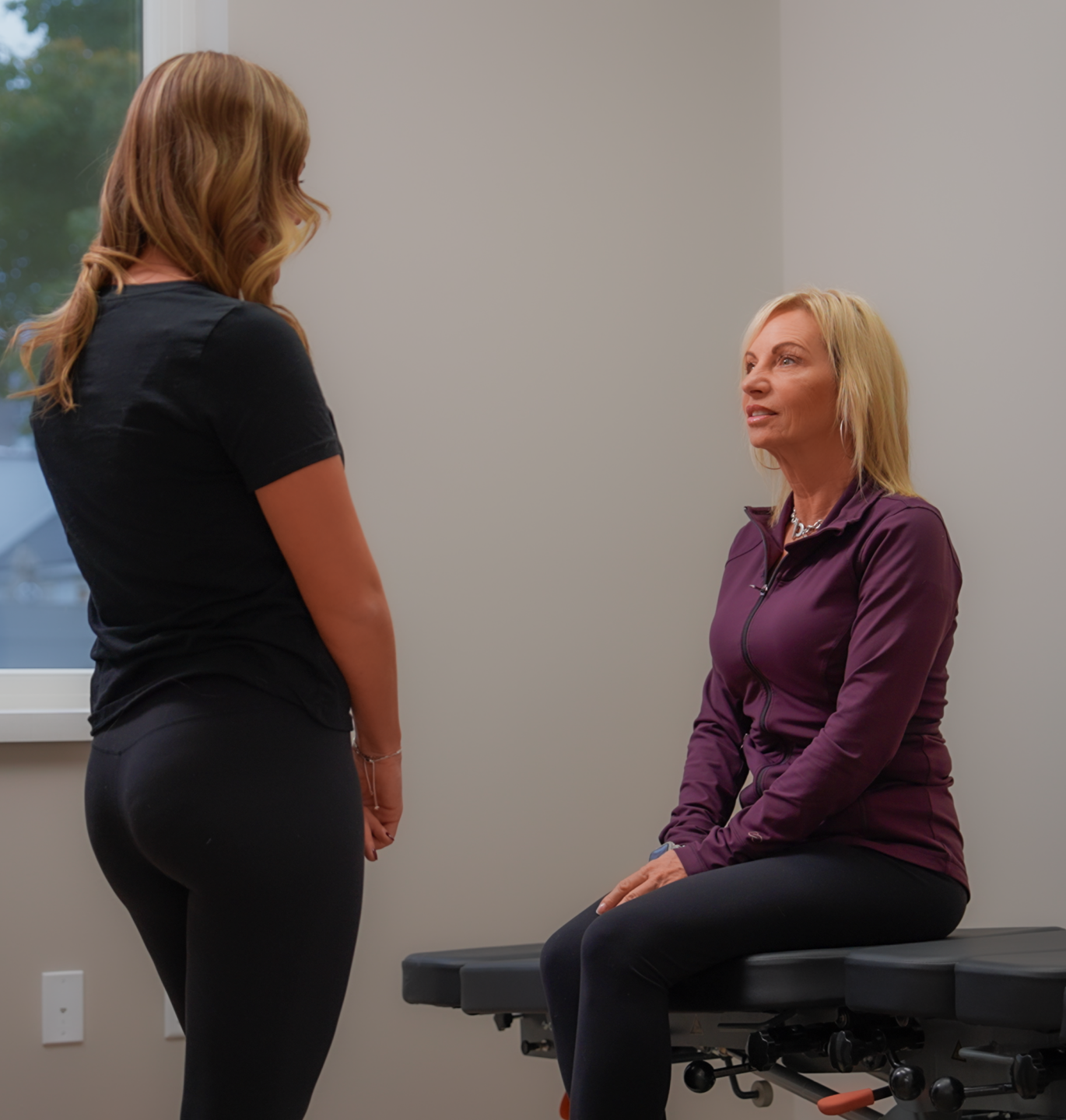 Chiropractic consultation session at The Renew Studio Romeo MI