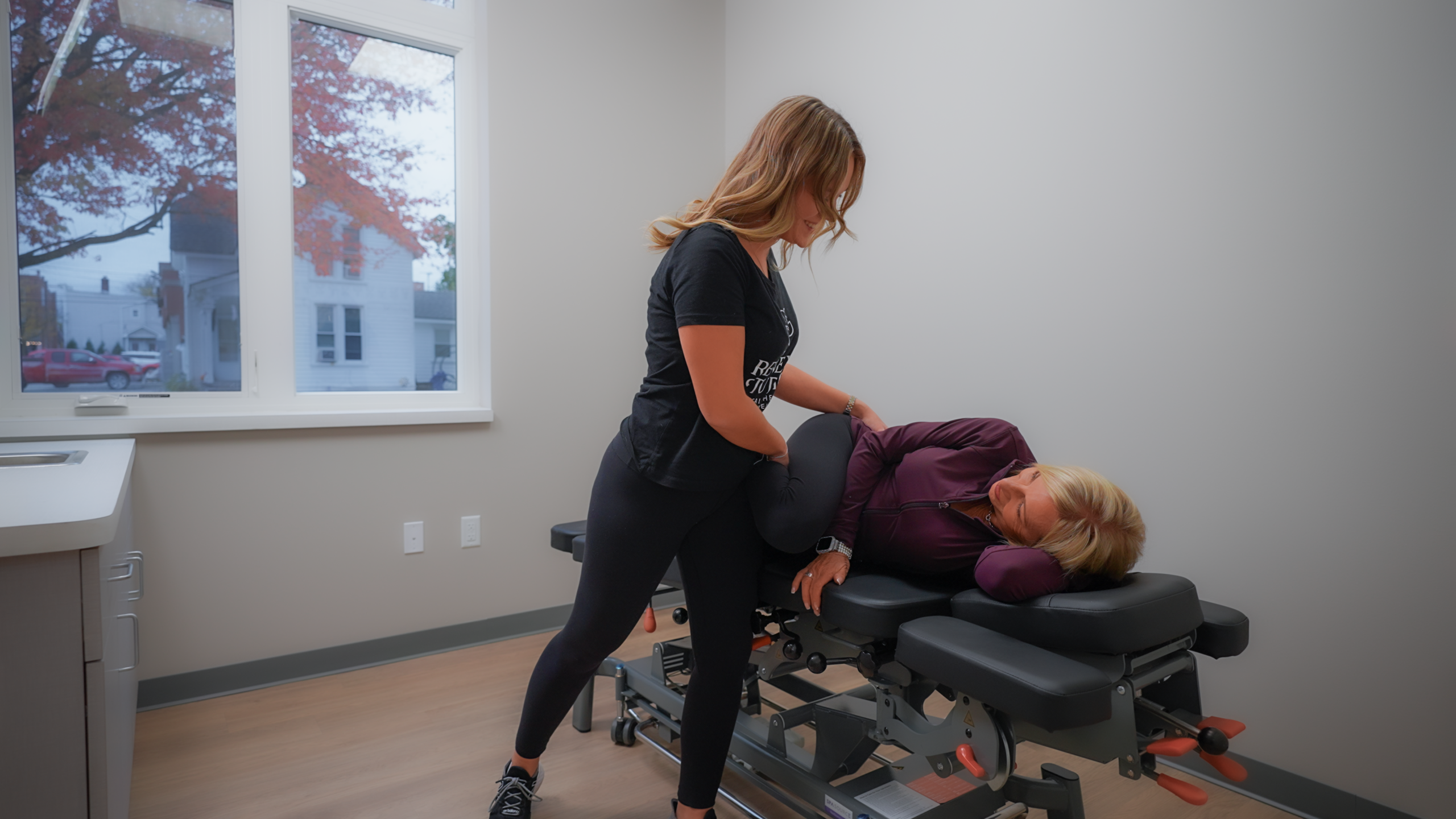 One-on-one chiropractic adjustment at The Renew Studio Romeo MI